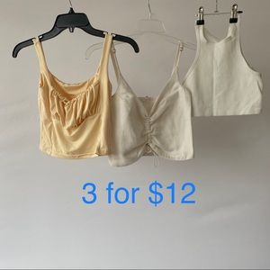 3 tops for 1 price, off white and light yellow, all Urban Outfitters